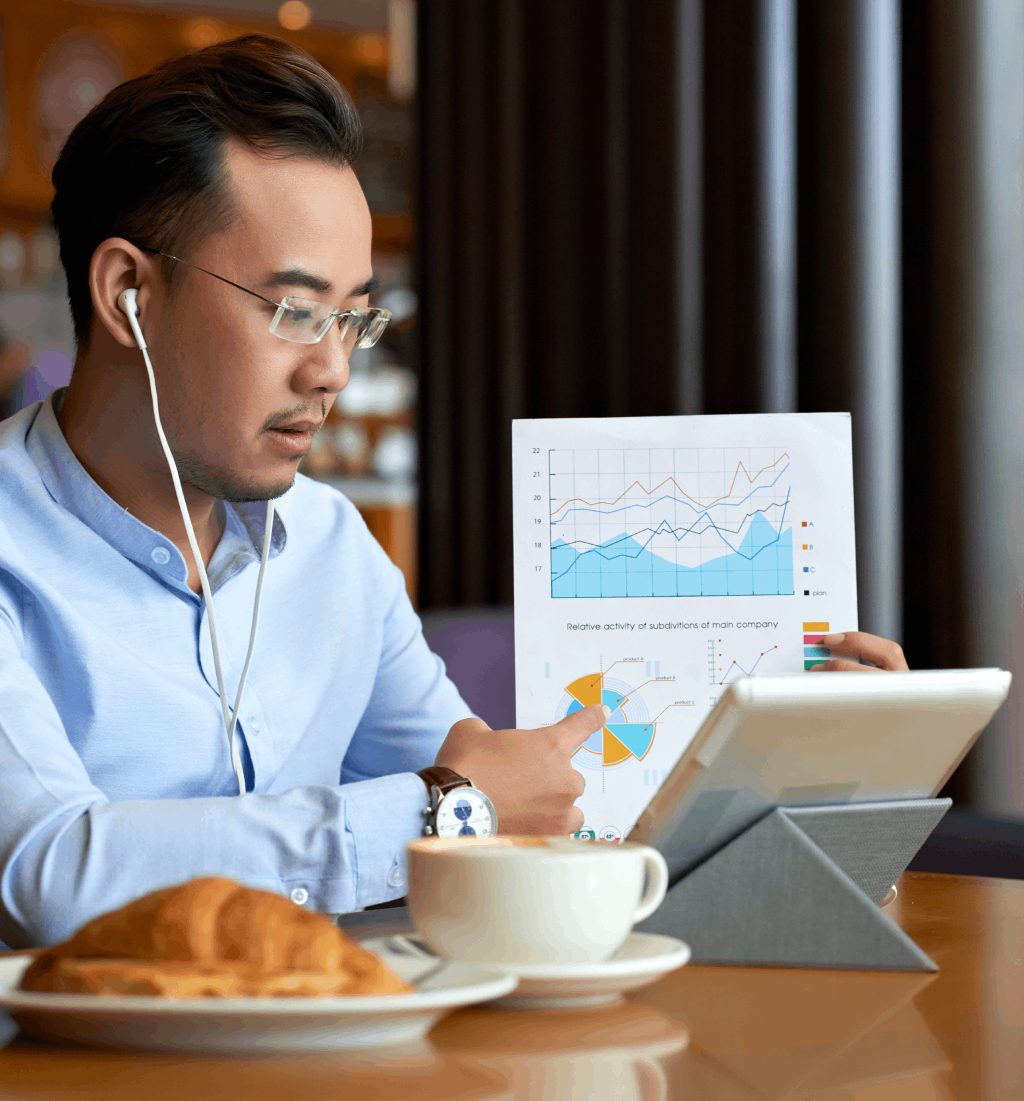 Business partners reviewing financial data on a video call