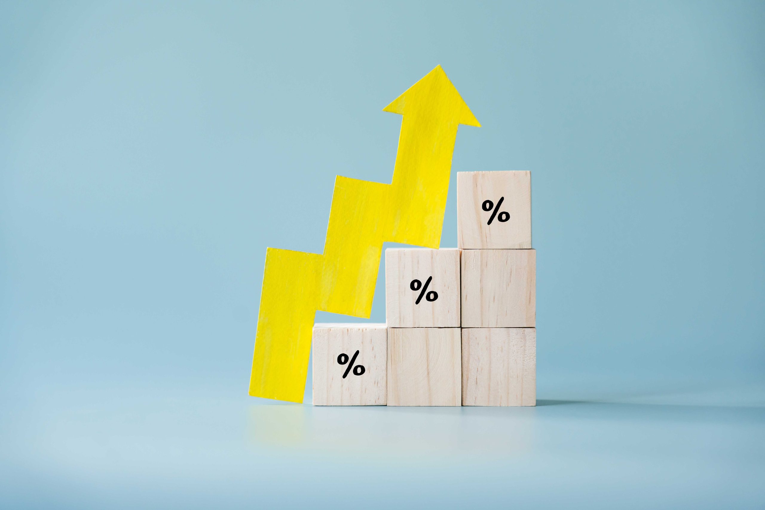Paper-cut arrow showing an upward trend